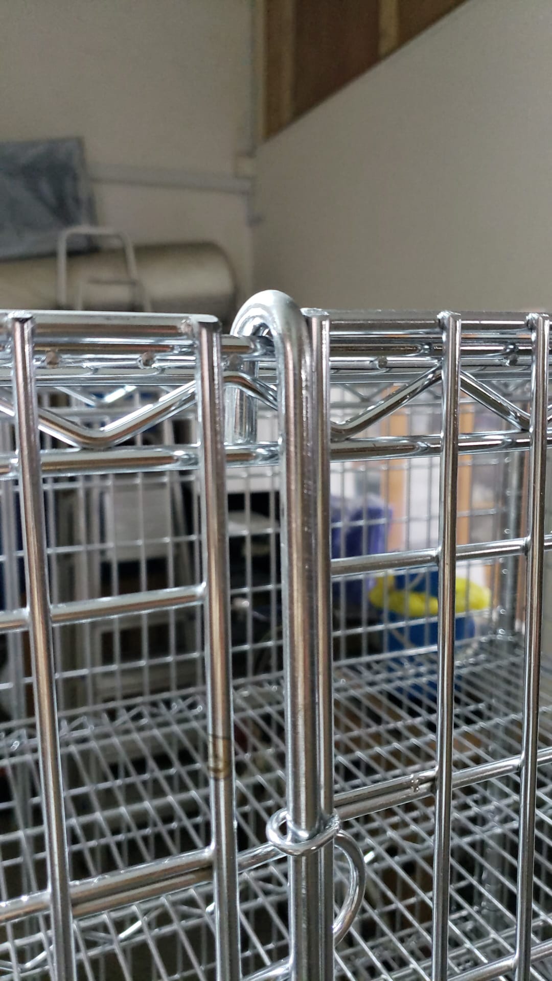 Chrome wire shelving cage corner sleeve and post detail — Phil Industries Singapore