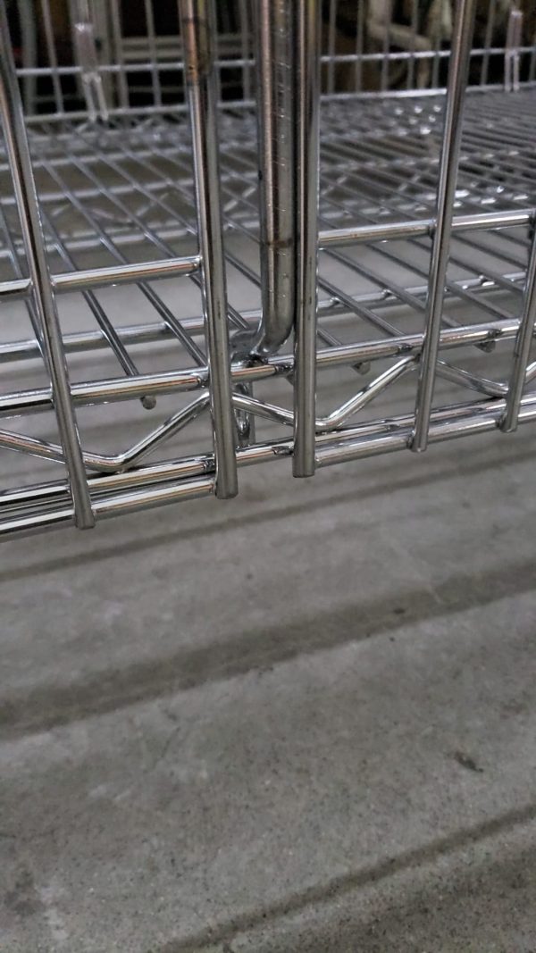 Chrome wire storage shelving base frame and shelf edge detail in Singapore warehouse