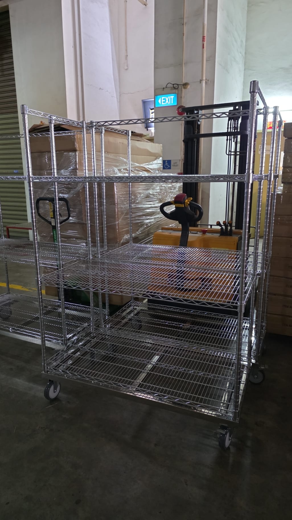 Heavy-duty chrome wire storage trolley with handle in Singapore warehouse