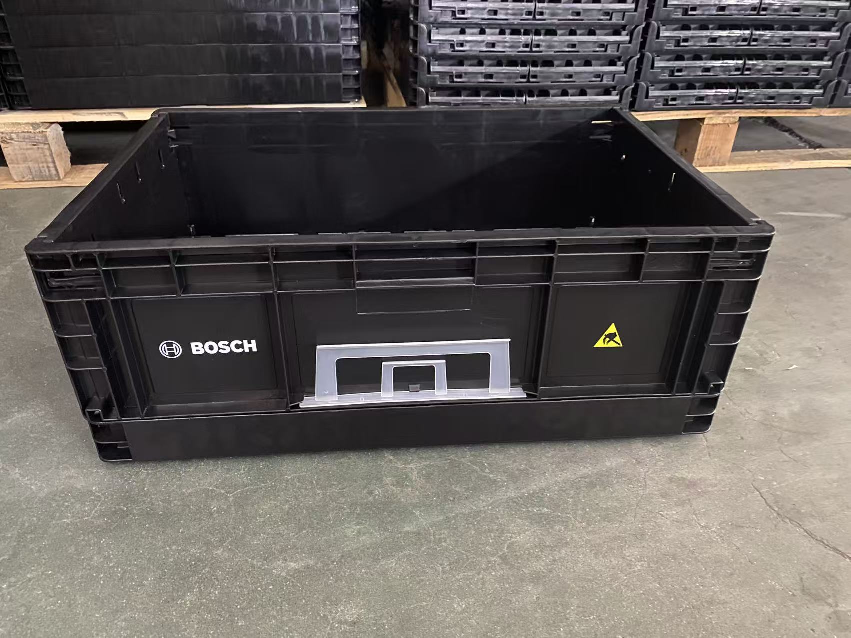 Conductive ESD storage box Singapore with Bosch logo and ESD warning symbol used in automotive electronics handling
