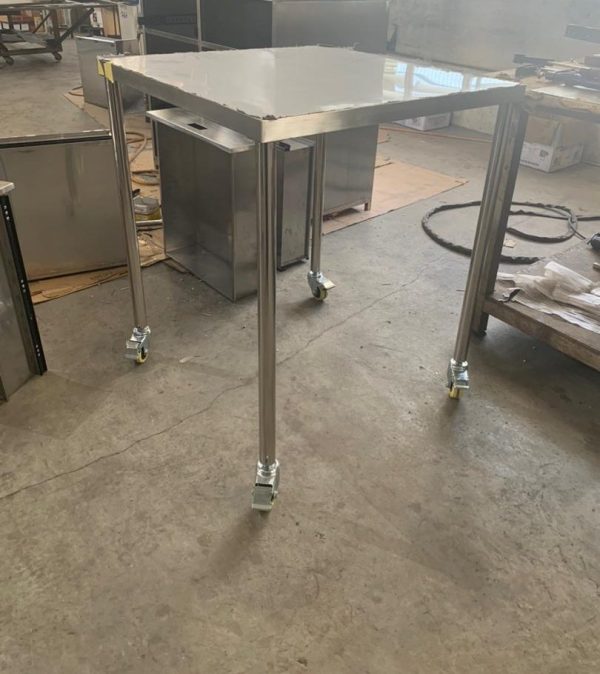 Mobile Stainless Steel Table on Lockable Castors – Singapore Mobile stainless steel table with square top on four lockable castors, fabricated in Singapore by Phil Industries