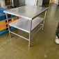 Two-tier stainless steel table with undershelf and round-tube legs, fabricated in Singapore by Phil Industries