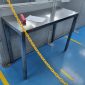 Slim cleanroom stainless steel bench with square legs against a partition wall on an ESD floor in Singapore
